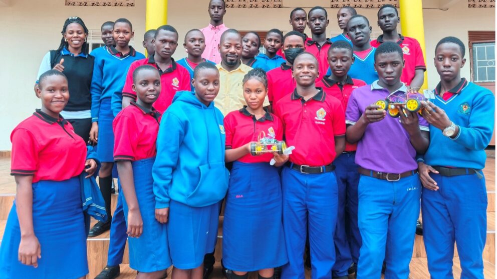 Group of students showing their robotics projects