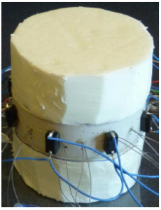 Measurement of a mortar disk with a cylindrical (air) defect. The top and bottom surfaces of the target are insulated with styrofoam, leading to (approximately) zero flux at the top and bottom surfaces