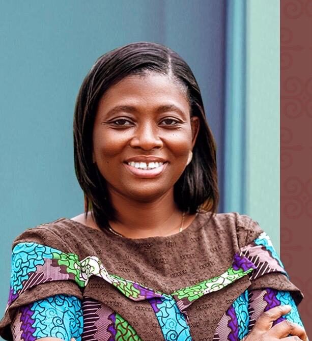 Professor Mary Boatemaa Setrana smiling to camera. 