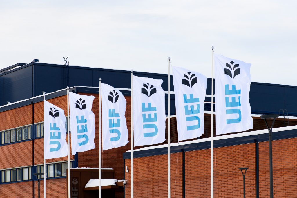 UEF flags in front of a building