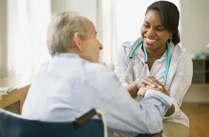 A carer and an elder patient. Image credit: MyFuture.com / CC BY-ND 2.0.