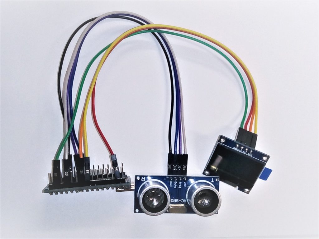 Arduino, ultrasonic sensor and OLED display wired