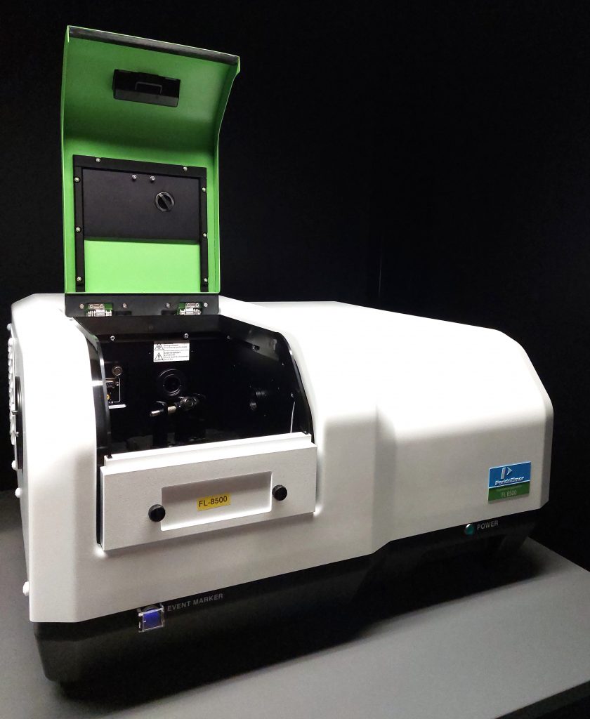 Photograph of PerkinElmer FL-8500 spectrofluorometer with the sample compartment open.
