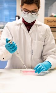 A researcher working in the lab