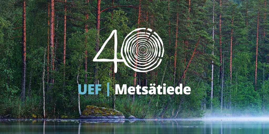 UEF Metsätiede logo, taustalla metsä 
